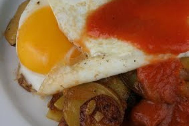 Yukon Gold and Chicken Apple Sausage Hash with Fried Eggs and Spicy Tomato Coulis