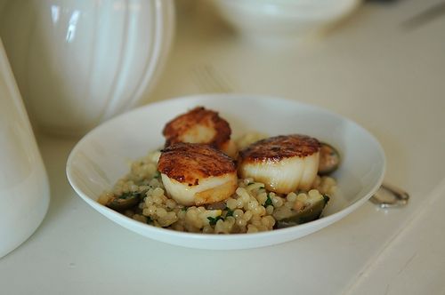 Israeli Couscous with Roasted Lemons &amp; Capers topped with Seared Scallops &amp; a Lemon Creme Fraiche Drizzle