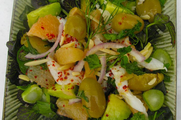 Ceviche with pink grapefruit and green olives