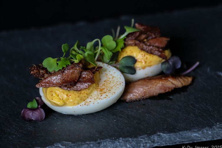 Chipotle and Duck Confit Deviled Eggs with Microgreens