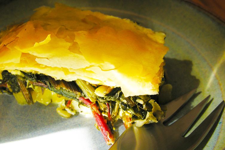 Harvest pie with swiss chard, cheese, orange zest and fennel