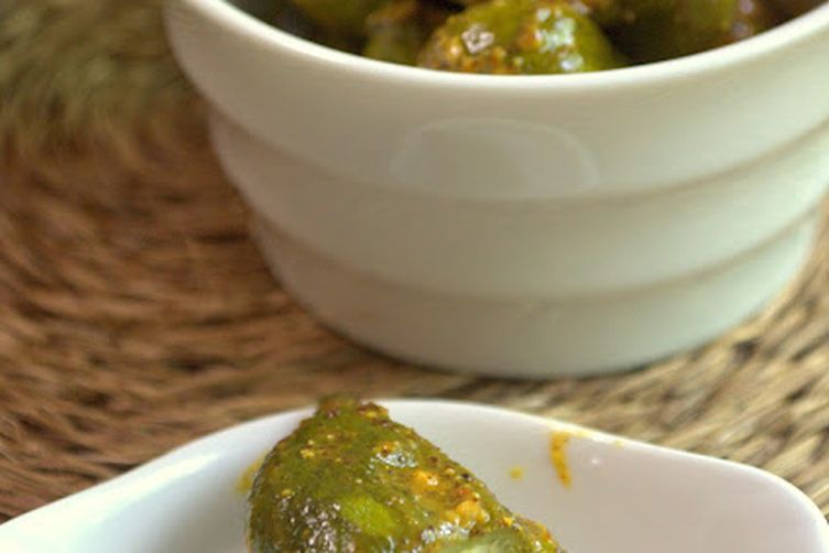 Pickled Baby mangoes in a chile mustard sauce (vadu Mangai)