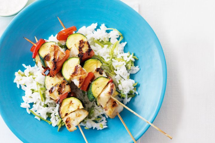 Fish and vegetable skewers with coconut rice