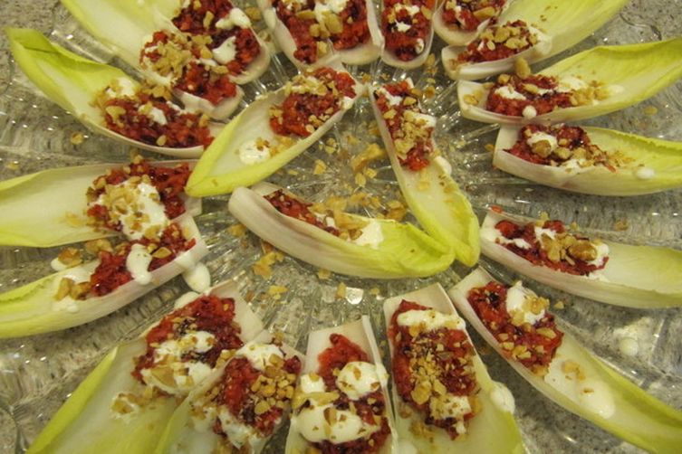 Cranberry and Persimmon Filled Endive with Tangy Goat Cheese Dressing
