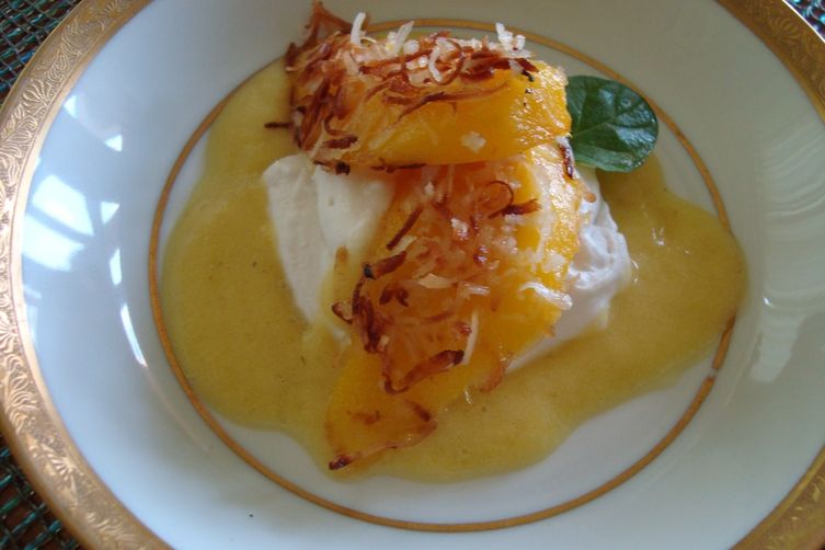 Coconut Crusted  Mango Slices with Pineapple Sauce and Whipped Coconut Cream